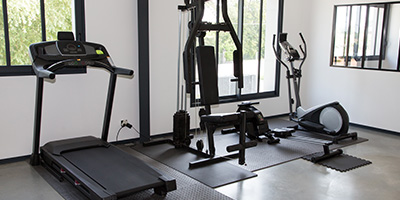 Home Gym With Treadmill and Press