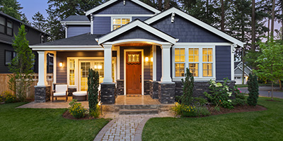 Blue House With Porch and Large Window