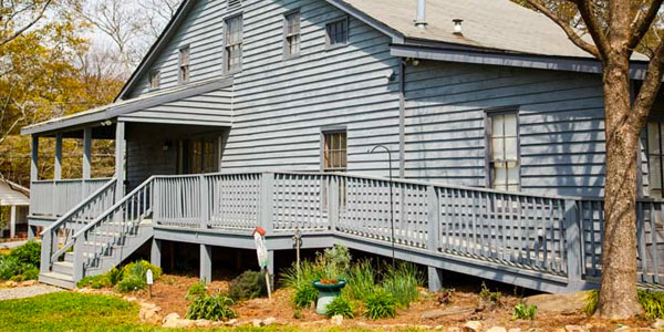 Grey House With Wheelchair Accessibility Ramp