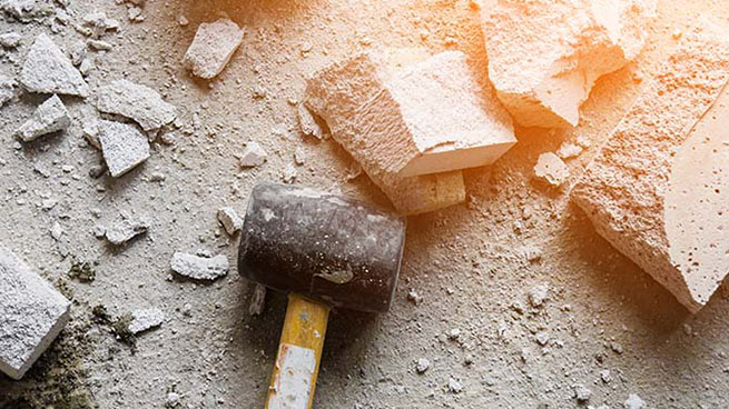 Hammer With Broken Concrete
