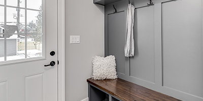 Grey Mudroom with Cubbies and Coathooks