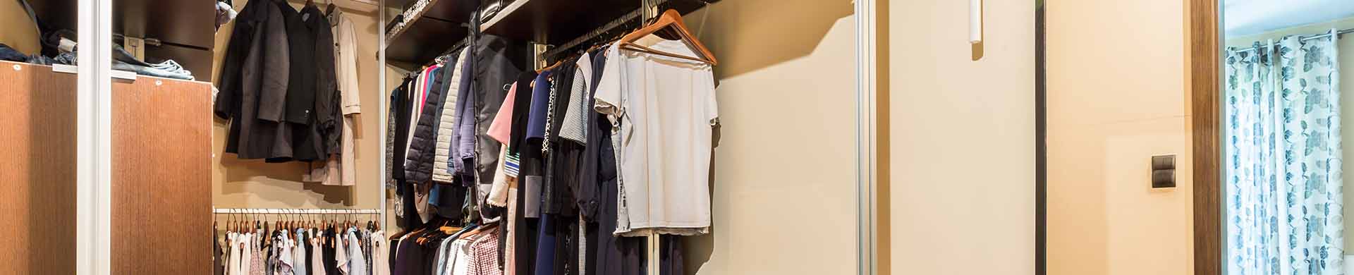 Walk-In Closet With Wooden Wardrobes