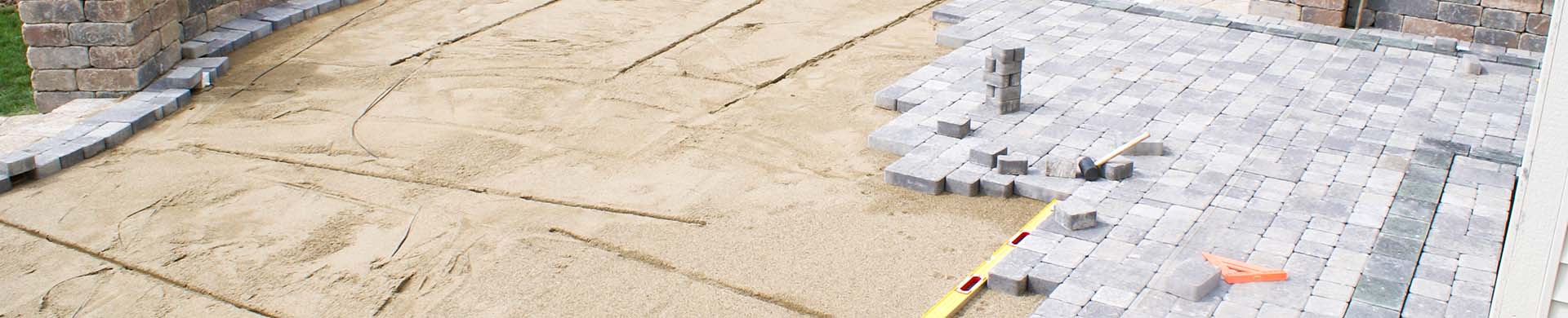 Paver Patio Being Installed in Backyard