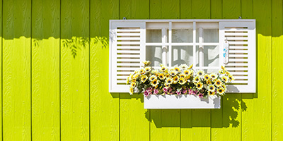 Window Box Hanging On Side Of Home Below Window