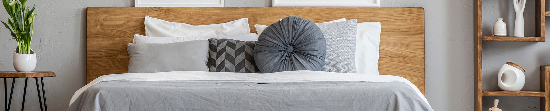 White Bed with Wooden Headboard