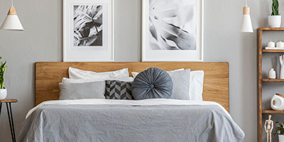 White Bed with Wooden Headboard