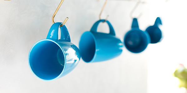 Hanging Blue Coffee Mugs in Kitchen