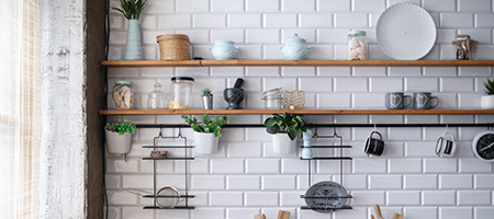 Open shelves in a galley kitchen.