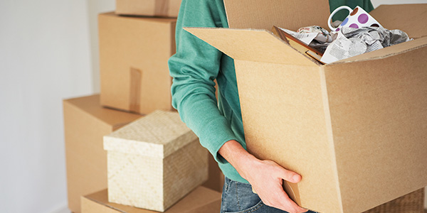 Man Carrying Moving Boxes