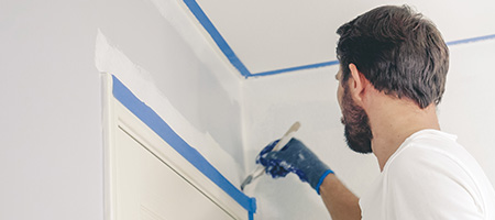 Man Painting Bathroom