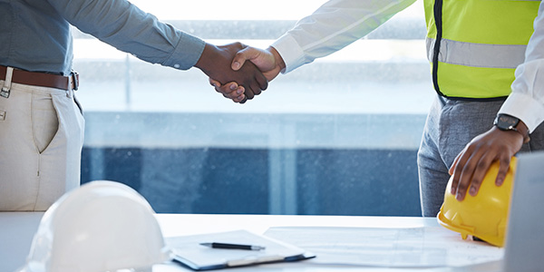 Man Shaking Hands With Contractor