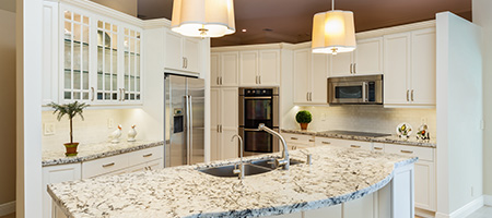 White Kitchen With Marble Countertops