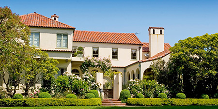 Stucco Mediterranean Style Home: Timeless Warmth.