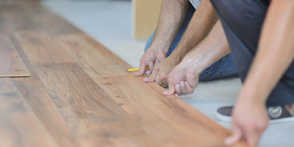 Men Installing Laminate Flooring