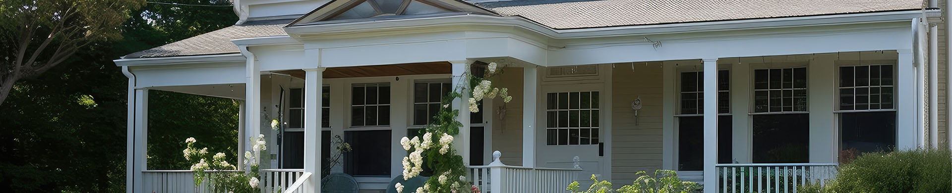 Beige Bungalow Surrounded by Flowers