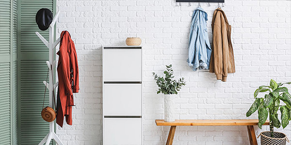 White Wooden Cubbies in Entrance Hallway.