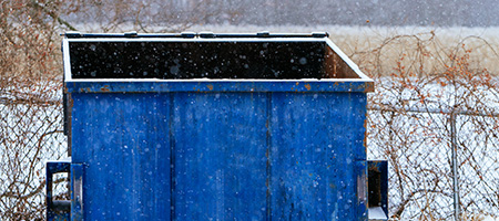 Dumpster With Open Lid in Winter