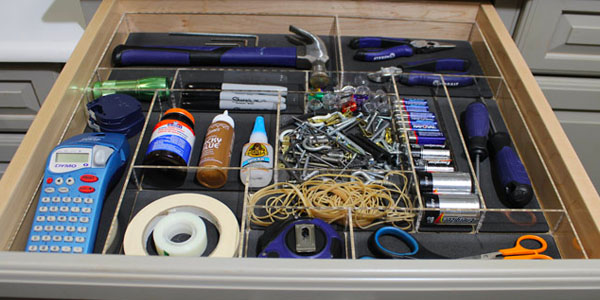 Organized Junk Drawer with Tools and Office Supplies