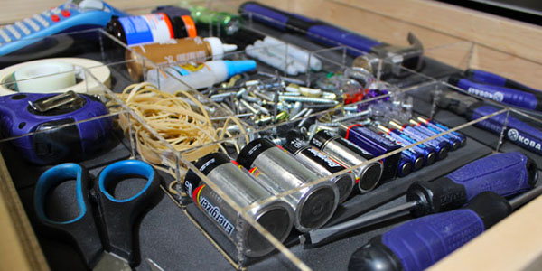 Organized Junk Drawer with Tools and Office Supplies