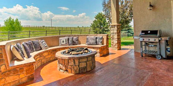 Outdoor Patio With Fire Pit at Colorado Springs Vacation Lodge Airbnb