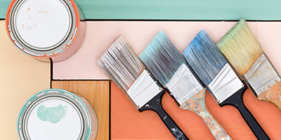Colorful Painted Boards With Paint Brushes