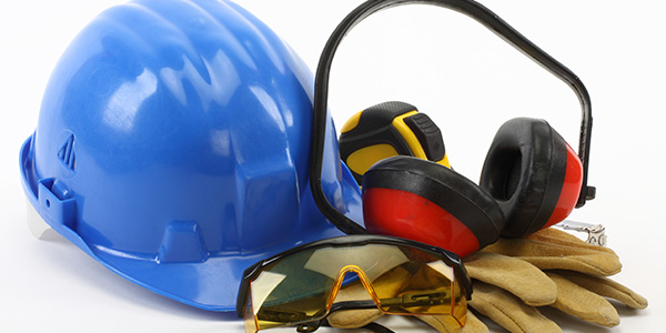 Personal safety gear including hard hat, ear protection, safety glasses and gloves.
