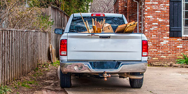 White Pickup Truck Filled With Lumber