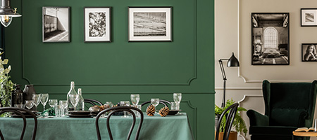 Posters on Green and White Dining Room Walls