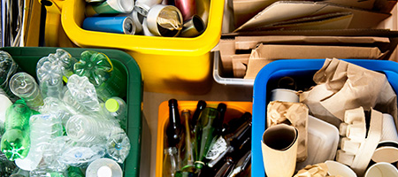 Recyclables Sorted Into Different Color Bins