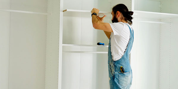 Removing an old closet system.