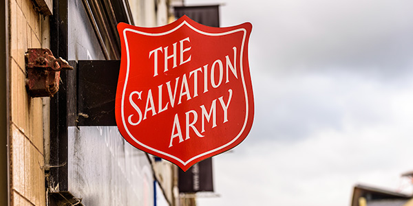 The Salvation Army Logo on Side of a Building.