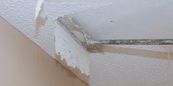 Scraper Removing Popcorn Ceiling