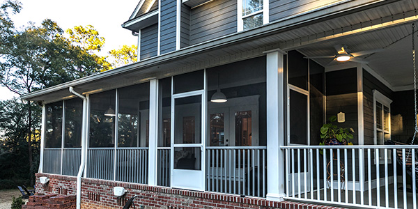 Two-Story Home With a Wrap-Around Screened-In Porch