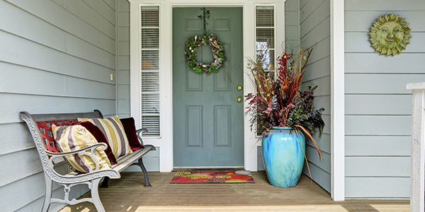 Small Front Porch with Couch and Potted Plants