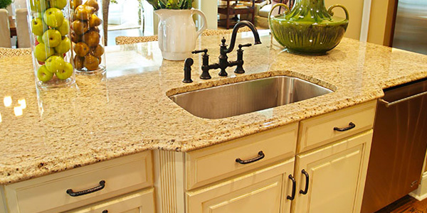 Small Kitchen Island With White Granite Countertop