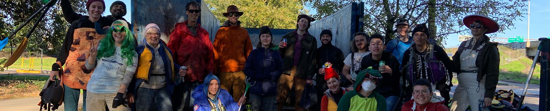 Columbia Slough Volunteers in Costume With Dumpster