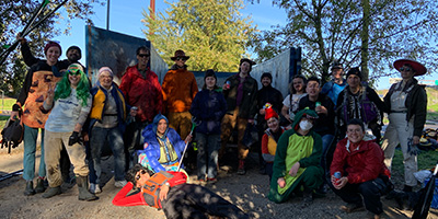 Columbia Slough Volunteers in Costume With Dumpster