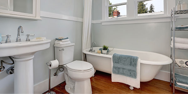 Tidy Bathroom With Pedestal Sink