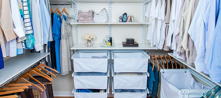 Organized Walk-In Closet with Shelving and Baskets
