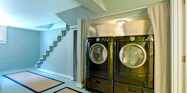 Unfinished Basement Laundry Area with Washer and Dryer