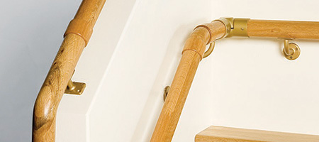Handrails Curving Toward the Wall