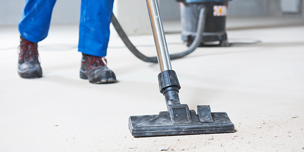 Person Vacuuming Dust With Shopvac