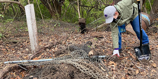 Volunteer Removes Scrap Metal and Fencing From an Illegal Dumpsite