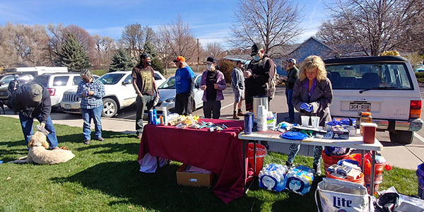 Volunteers Take Break During Cleanup