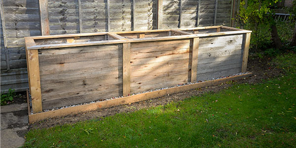 Raised Wooden Planter in Yard