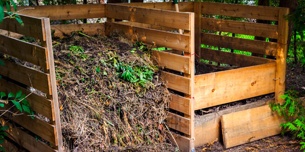 Two Homemade Wood Slat Compost Bins