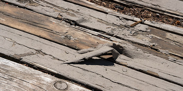 Worn Wooden Deck With Peeling Paint