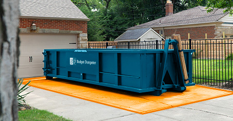 Roll Off Dumpster on Colored Delivery Area