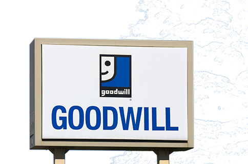 Goodwill Logo on Sign With Blueprint Background