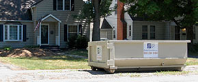 Roll Off Dumpster in Front of a House